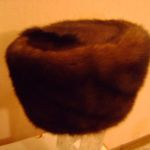 Продам новую женскую шапку 57-58 норка тёмно коричневаявая